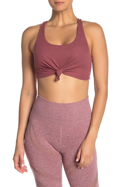 Shop Alo Yoga Knot Sports Bra In Rosewood