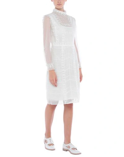 Shop Burberry Knee-length Dress In White