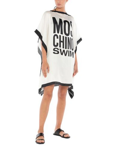 Shop Moschino Cover-ups In White