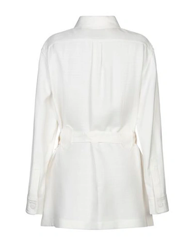 Shop Roberto Cavalli Overcoats In White
