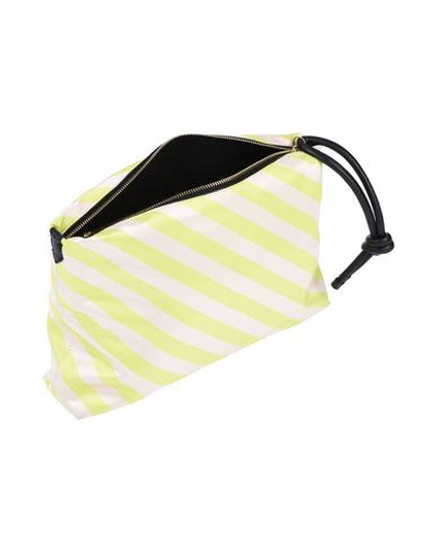 Shop Dries Van Noten Handbags In Yellow