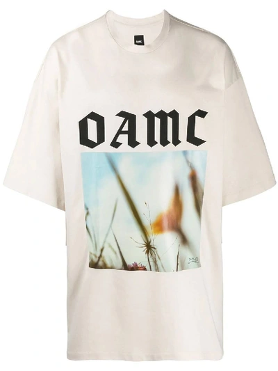 Shop Oamc Over-sized Logo Graphic Print T-shirt In Neutral