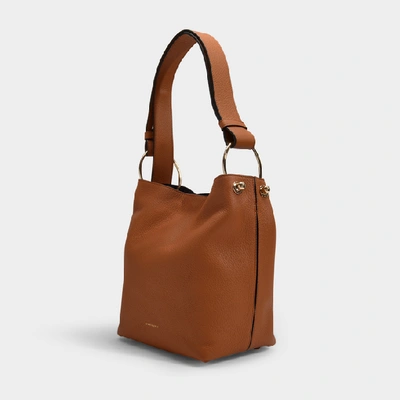 Shop Strathberry Lana Midi Bucket Bag In Brown