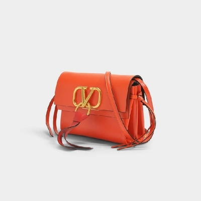 Shop Valentino Vring Crossbody Bag In Orange