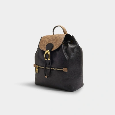 Shop Coach Evie Backpack In Black Leather And Tan Signature Coated Canvas