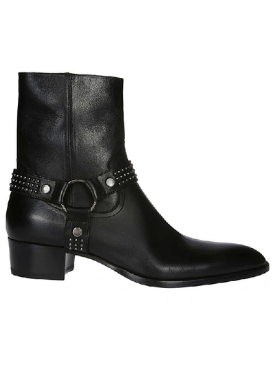 Shop Saint Laurent Harness Studded Ankle Boots In Black