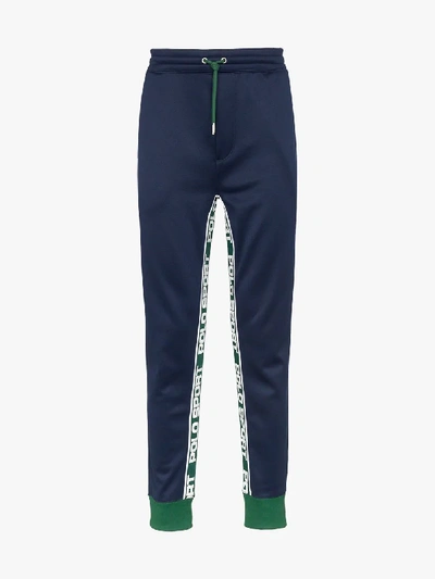 Shop Polo Ralph Lauren Logo Stripe Sweatpants In Blue