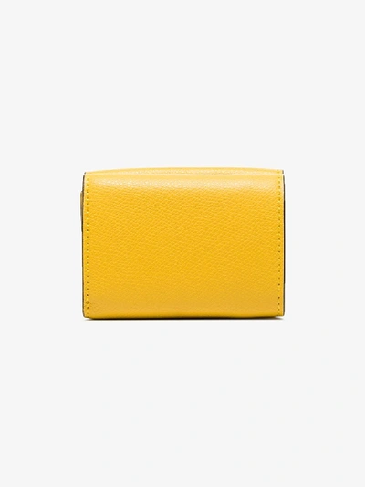 Shop Fendi Yellow And Brown Logo Trifold Leather Wallet