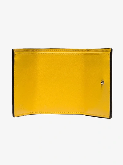 Shop Fendi Yellow And Brown Logo Trifold Leather Wallet