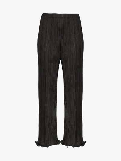 Shop Givenchy Pleated Ruffle Hem Trousers In Black