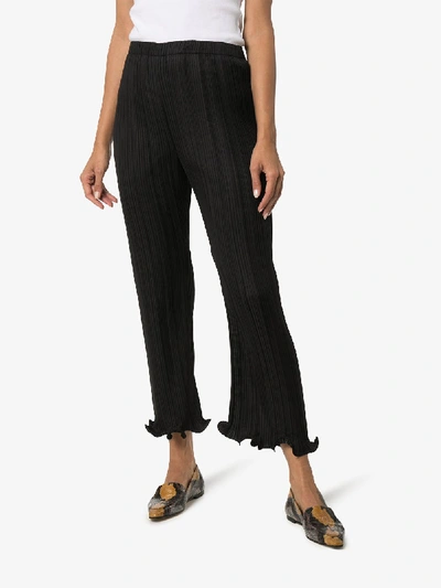 Shop Givenchy Pleated Ruffle Hem Trousers In Black