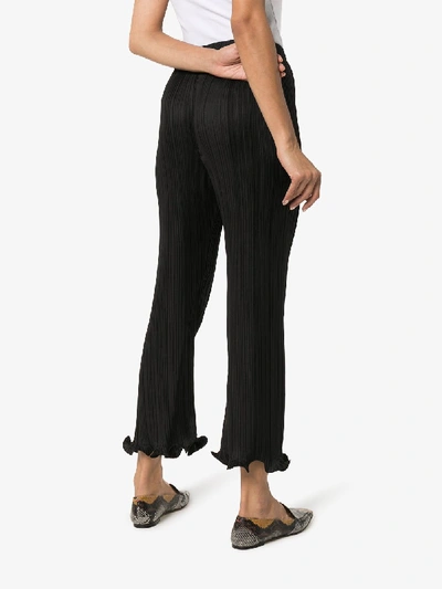 Shop Givenchy Pleated Ruffle Hem Trousers In Black