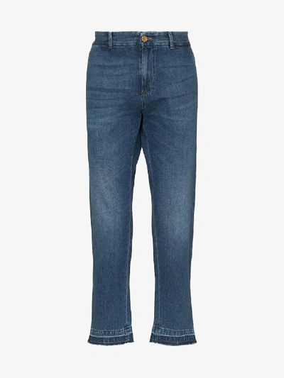 Shop Gucci Logo Embroidered Tapered Jeans In Blue