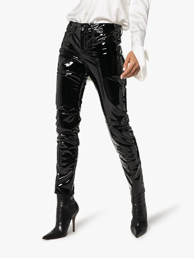 Shop Saint Laurent Skinny Leather Vinyl Trousers In Black
