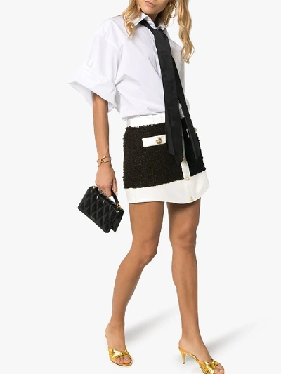 Shop Balmain Tweed Buttoned Mini Skirt In Black