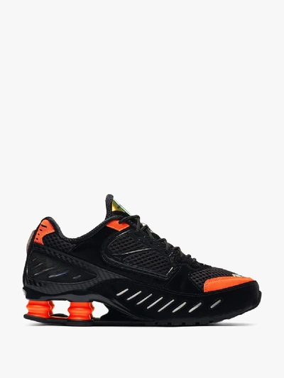 Shop Nike Black And Orange Shox Enigma Sneakers