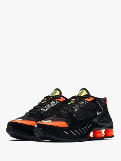 Shop Nike Black And Orange Shox Enigma Sneakers