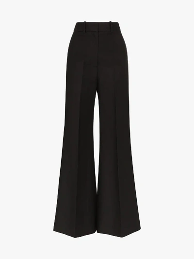 Shop Khaite Bernadette Wide Leg Cotton Trousers In Black