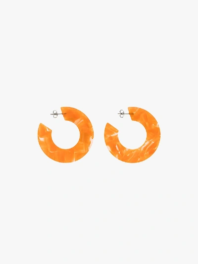 Shop Aym Orange Ananda Hoop Earrings
