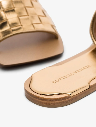 Shop Bottega Veneta Metallic Gold Intrecciato Flat Leather Sandals