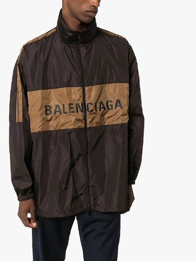 Shop Balenciaga Logo Windbreaker Jacket In Brown