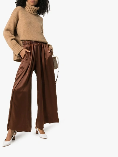 Shop Deitas Pleated Silk Palazzo Trousers In Brown