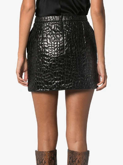 Shop Saint Laurent Mock Croc Mini Skirt In Black