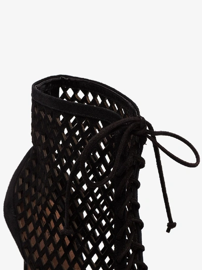 Shop Alaïa Black 110 Cutout Laced Suede Ankle Boots