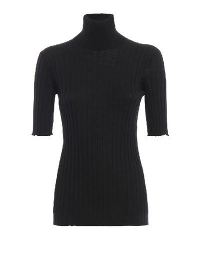 Shop Bottega Veneta Ribbed Wool Turtleneck Sweater In Black