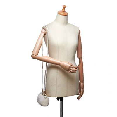 Shop Fendi Shearling Micro Peekaboo Crossbody Bag In Neutrals