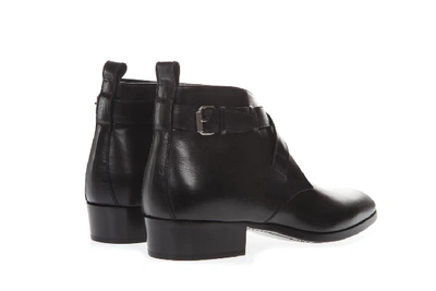 Shop Saint Laurent Black Wyatt Leather Ankle Boots