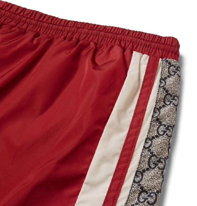 Shop Gucci Long-length Striped Logo-print Swim Shorts In Red