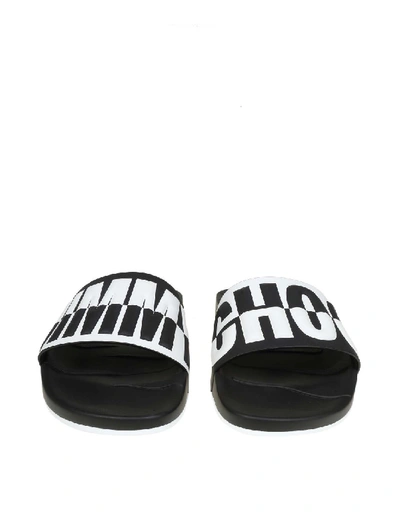 Shop Jimmy Choo Rey / M Leather Slippers With Relief Logo In Black