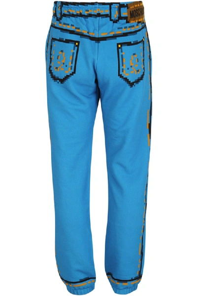 Shop Moschino Fleece Pants Pixel Capsule In Blue