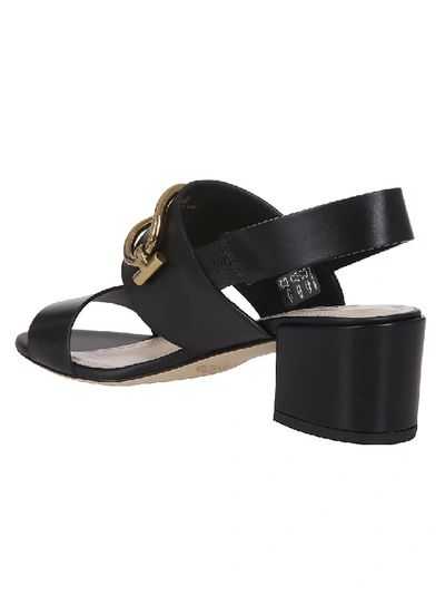 Shop Tod's Black Sandal With Gold Accessory