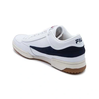 Shop Fila T1 Mid Sneakers In White