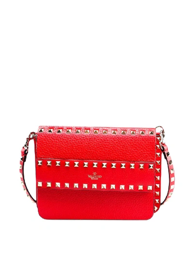 Shop Valentino Rockstud Leather Small Cross Body Bag In Red