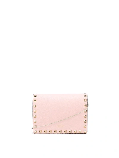 Shop Valentino Rockstud Pebble Leather Cross Body Bag In Neutrals