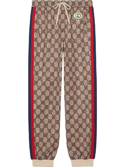 Shop Gucci Neutral Women's Gg Supreme Print Jogging Pants In Brown