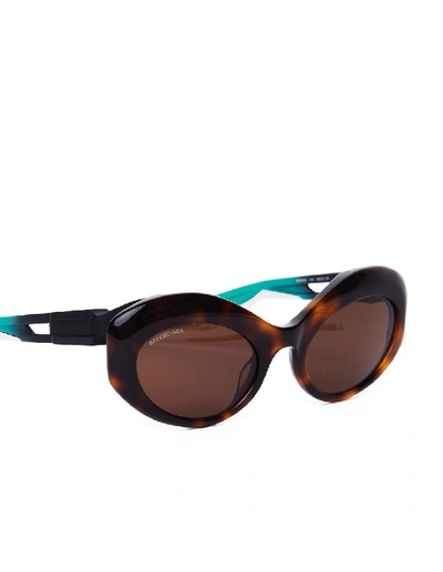 Shop Balenciaga Hybrid Oval Sunglasses In Black