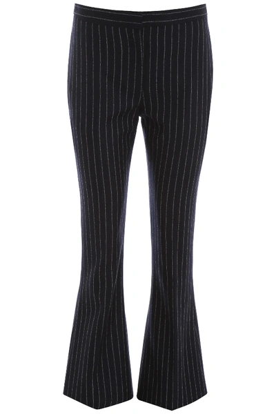 Shop Alexander Mcqueen Pinstriped Trousers In Navy Ivory (blue)