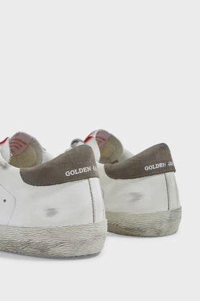 Shop Golden Goose Superstar Leather Trainers In White