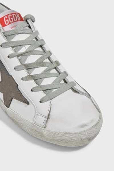 Shop Golden Goose Superstar Leather Trainers In White