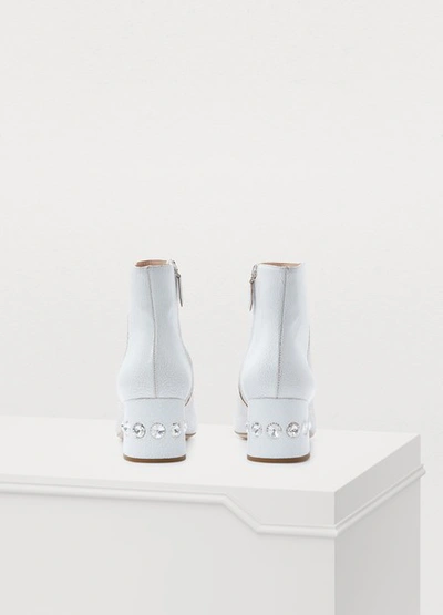Shop Miu Miu Embossed Leather Ankle Boots In Bianco