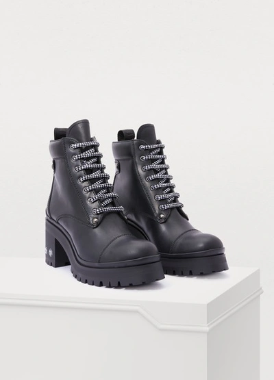 Shop Miu Miu Laced Leather Ankle Boots In Nero