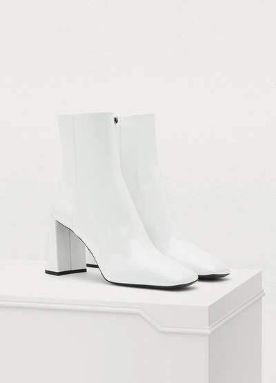 Shop Prada Square Toe Ankle Boots In White Pat