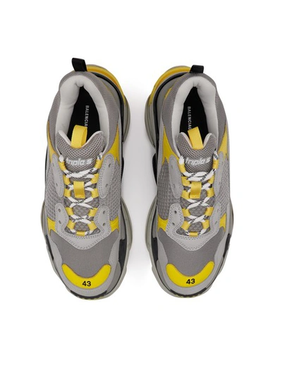 Shop Balenciaga Triple S Trainers In Yellow