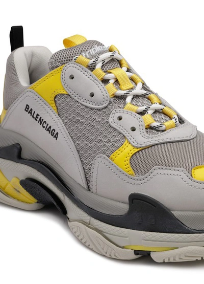 Shop Balenciaga Triple S Trainers In Yellow