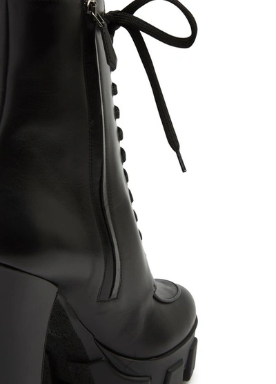 Shop Prada Platform Ankle Boots In Nero