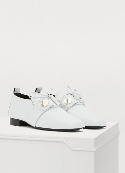 Shop Pierre Hardy Penny Derbies In White